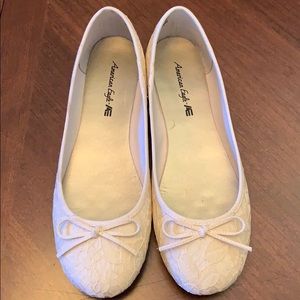 Cream colored lace flats